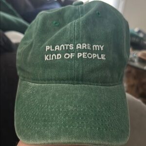 Green Cap with Embroidered Text